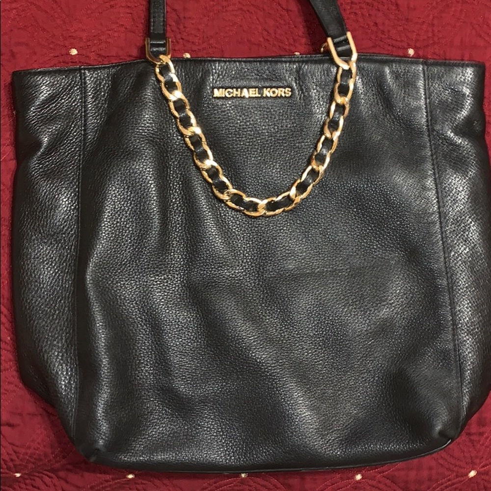 Black Michael Kors shoulder bag.